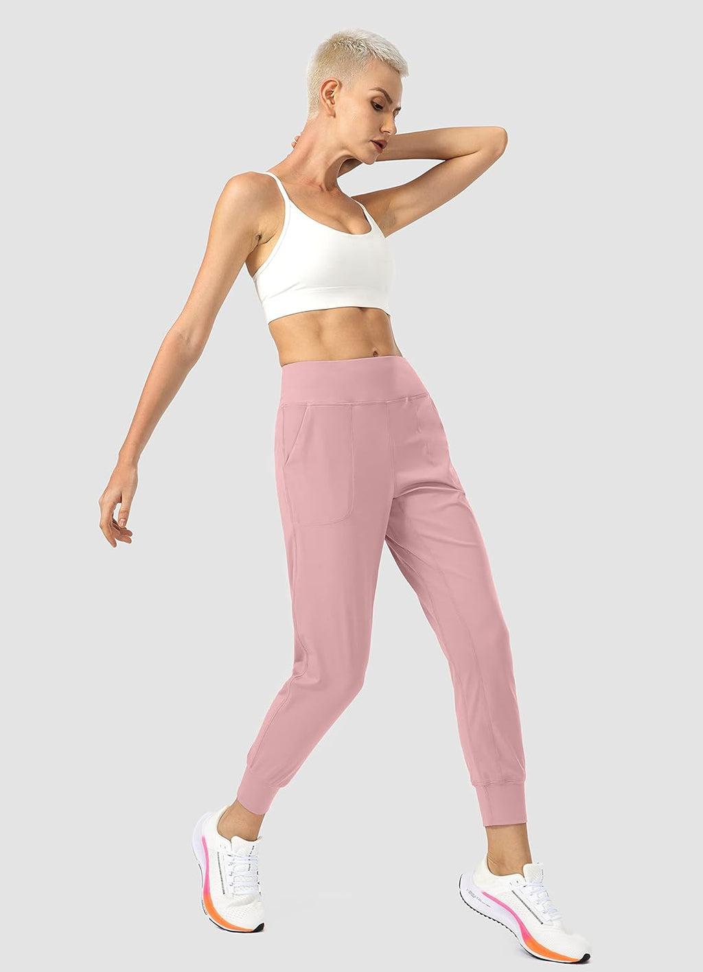 Elevate Your Workout with Our Stylish High-Waisted Women's Joggers Featuring Convenient Zipper Pockets in Pink